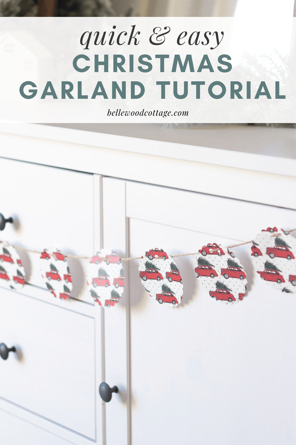A Christmas garland hanging on a sideboard with overlaid words, "Quick and Easy Christmas Garland Tutorial."