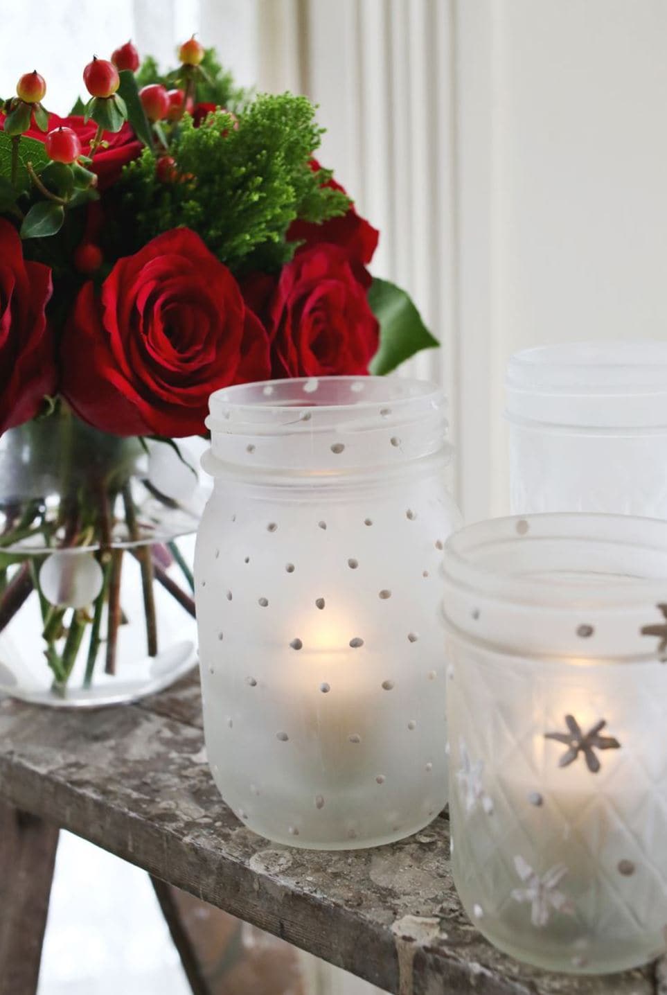 Frosted mason jars with snowflakes.