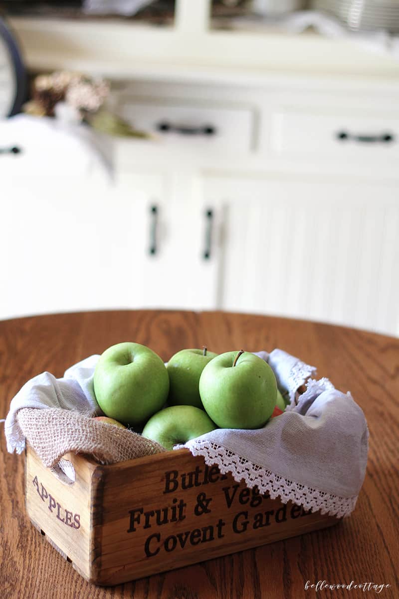 Learn how to maximize your decorating budget and use the decor you already own to style a beautiful fall farmhouse hutch!