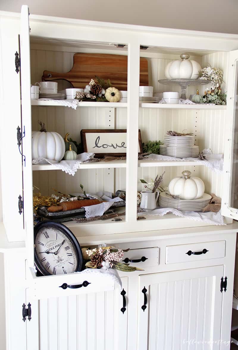 Learn how to maximize your decorating budget and use the decor you already own to style a beautiful fall farmhouse hutch | from Bellewood Cottage