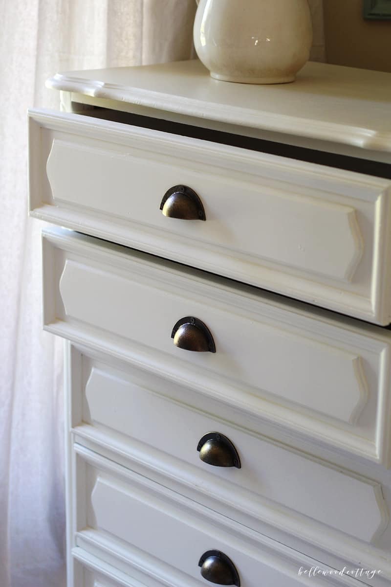 Learn how I transformed this $10 garage sale dresser into a statement French country piece with just a little time and paint.