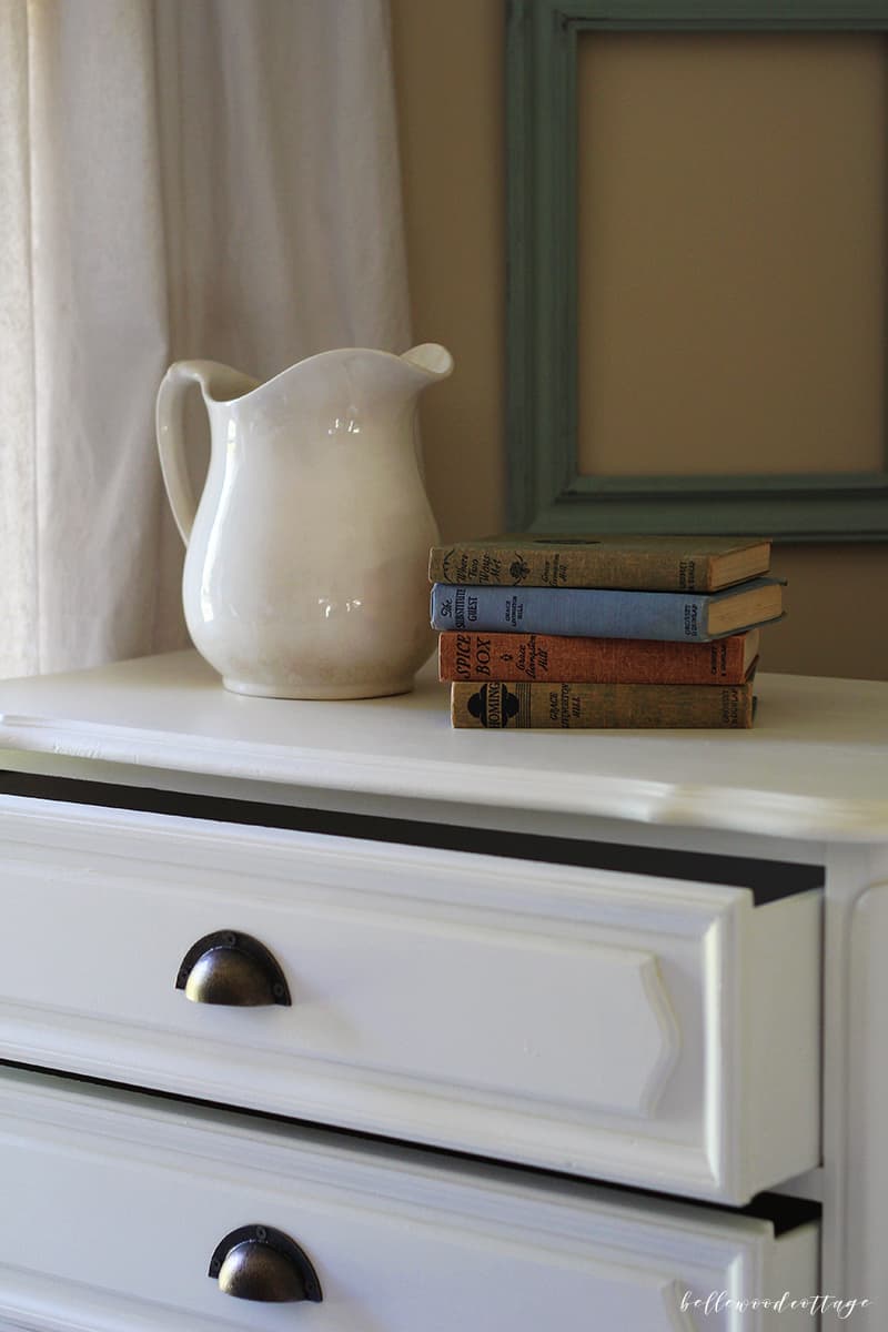 Learn how I transformed this $10 garage sale dresser into a statement French country piece with just a little time and paint.