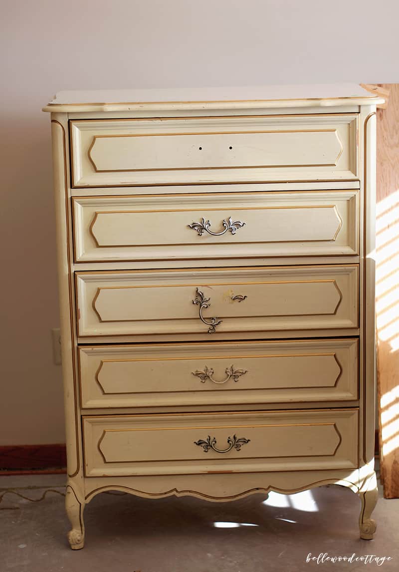 Learn how I transformed this $10 garage sale dresser into a statement French country piece with just a little time and paint. 