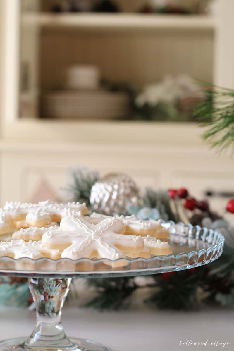 Much like a gingerbread house, sugar cookies decorated with royal icing can become a festive part of your Christmas decor. From Bellewood Cottage.