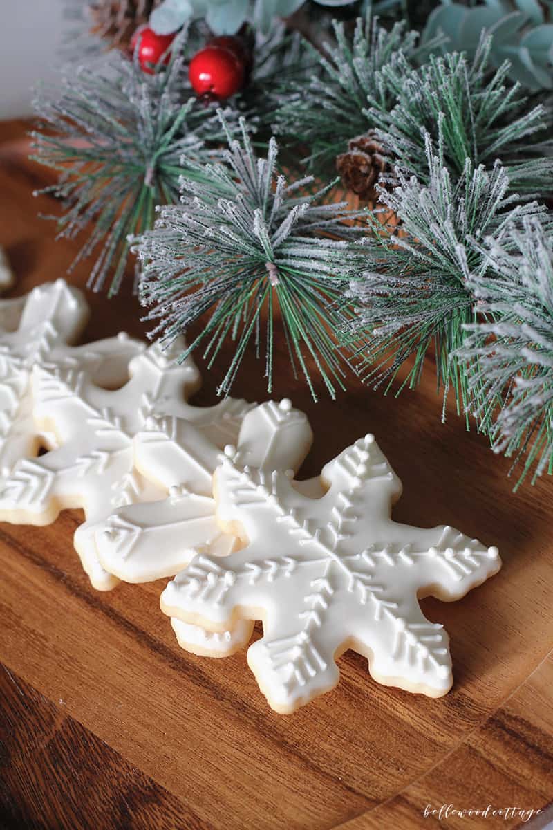 Much like a gingerbread house, sugar cookies decorated with royal icing can become a festive part of your Christmas decor. From Bellewood Cottage.
