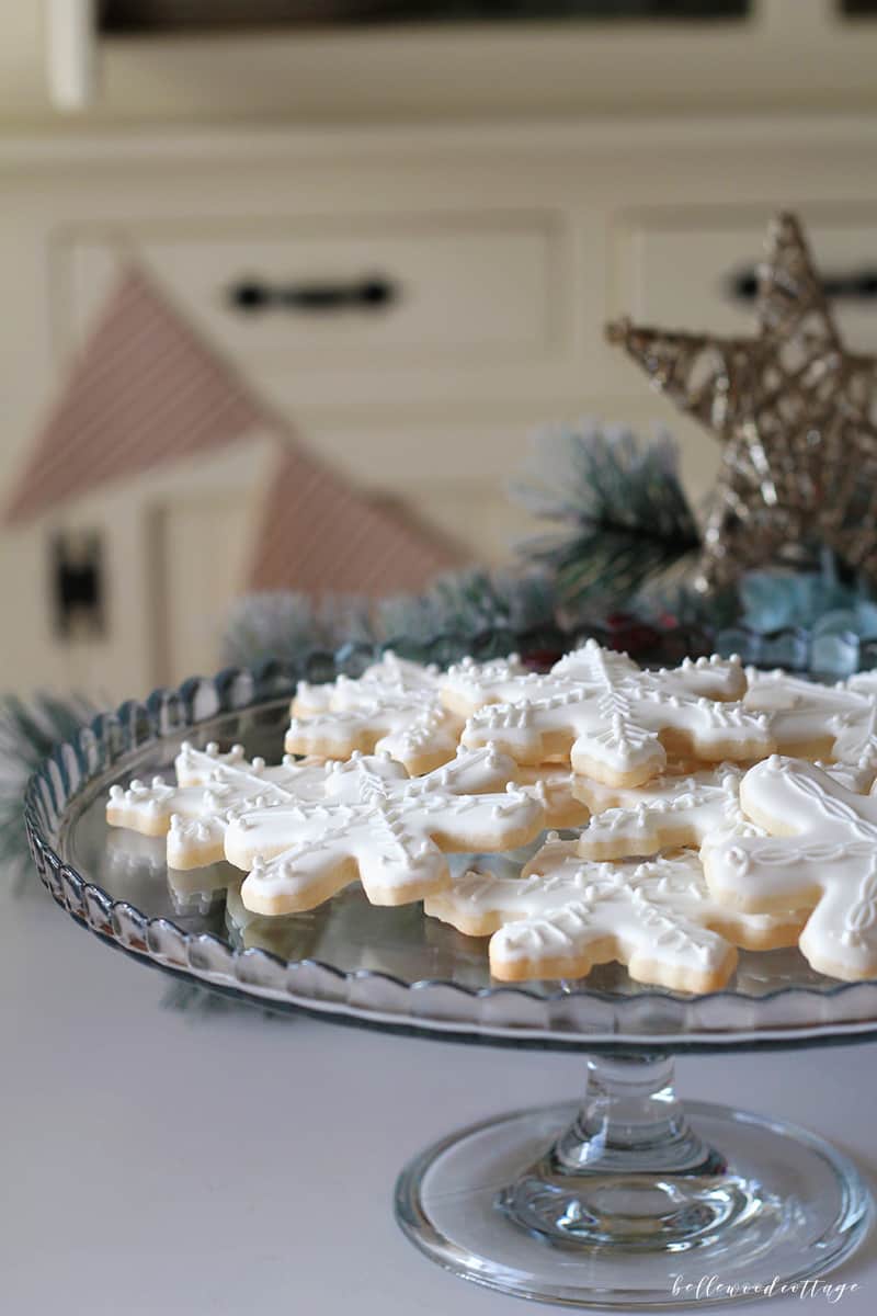 Much like a gingerbread house, sugar cookies decorated with royal icing can become a festive part of your Christmas decor. From Bellewood Cottage.