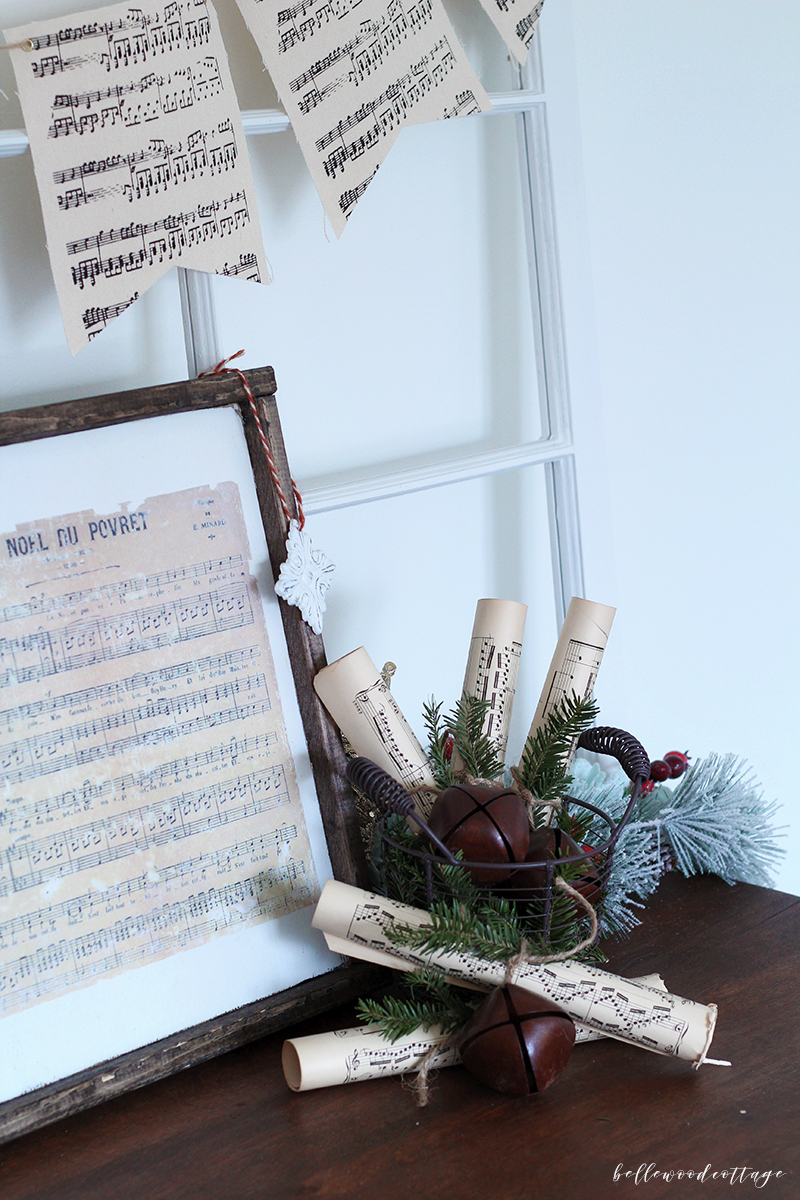 Get inspired to create pretty DIY Christmas decorations with this easy idea for incorporating sheet music decor and fresh pine into your homemade Christmas!