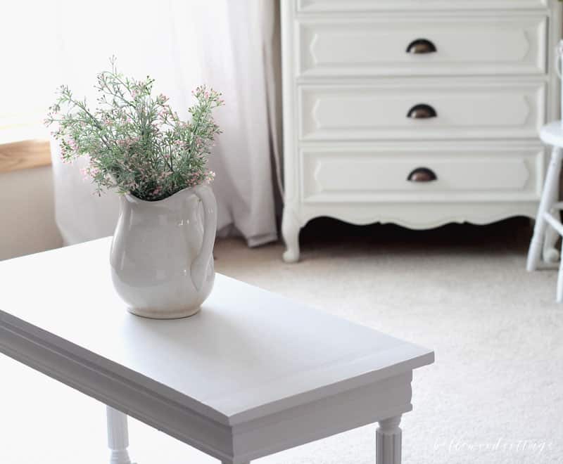 Learn how to give your worn-out furniture another chance with a little patience + chalk style paint. I'm sharing all about how I DIYed this piano bench flip on BellewoodCottage.com!