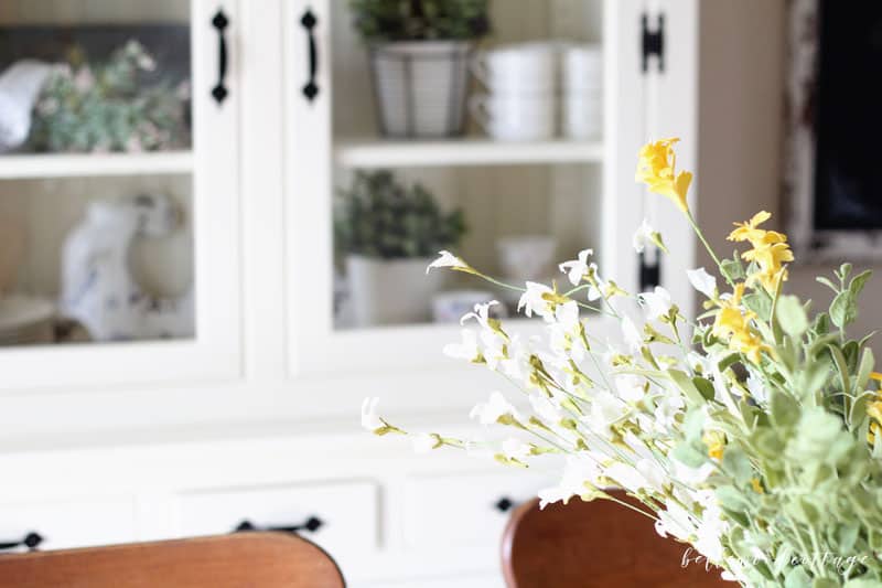 Learn how to bring the spring season into your home (even if the weather isn't cooperating!) with my simple tips on how to style a hutch for spring!