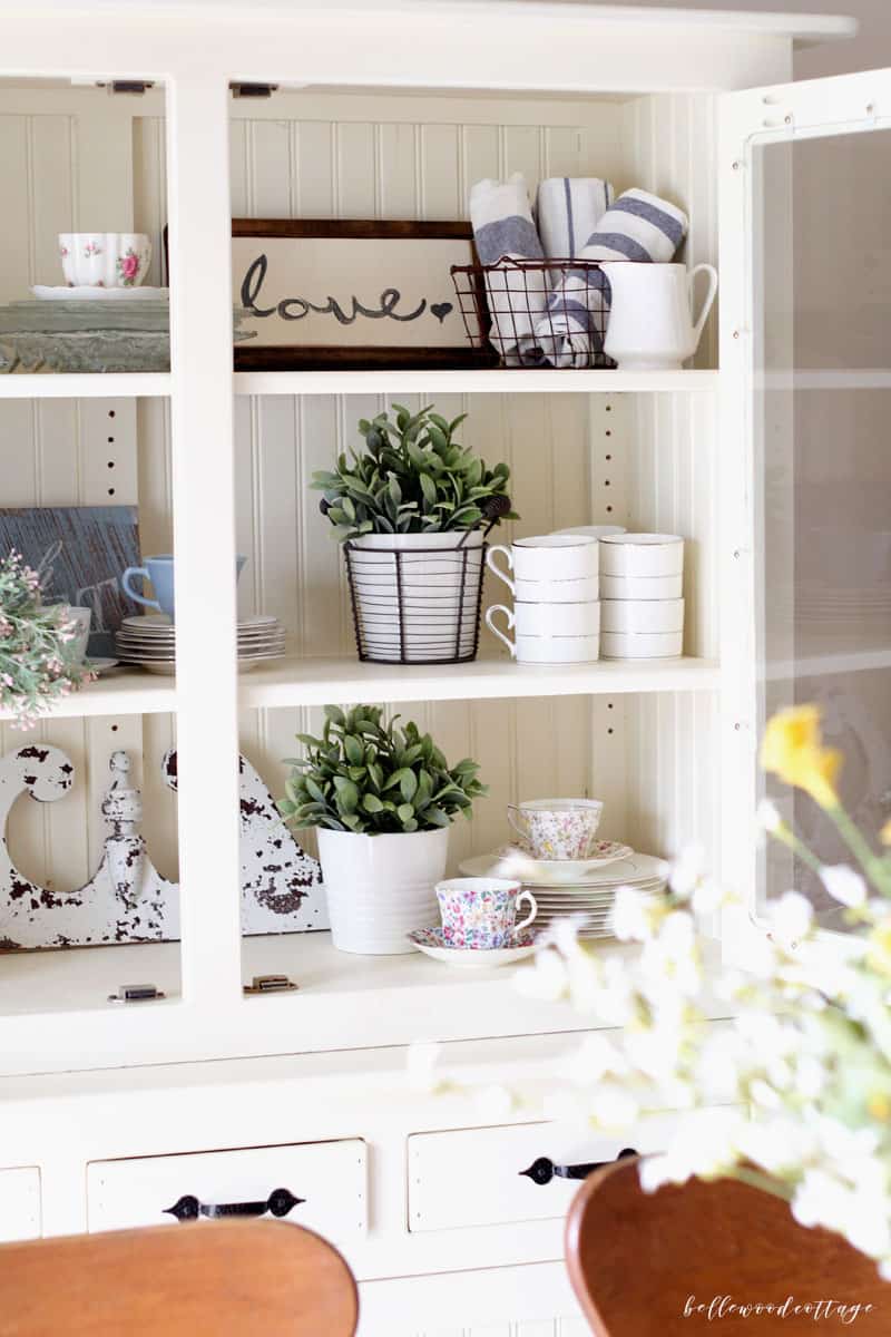 Learn how to bring the spring season into your home (even if the weather isn't cooperating!) with my simple tips on how to style a hutch for spring!