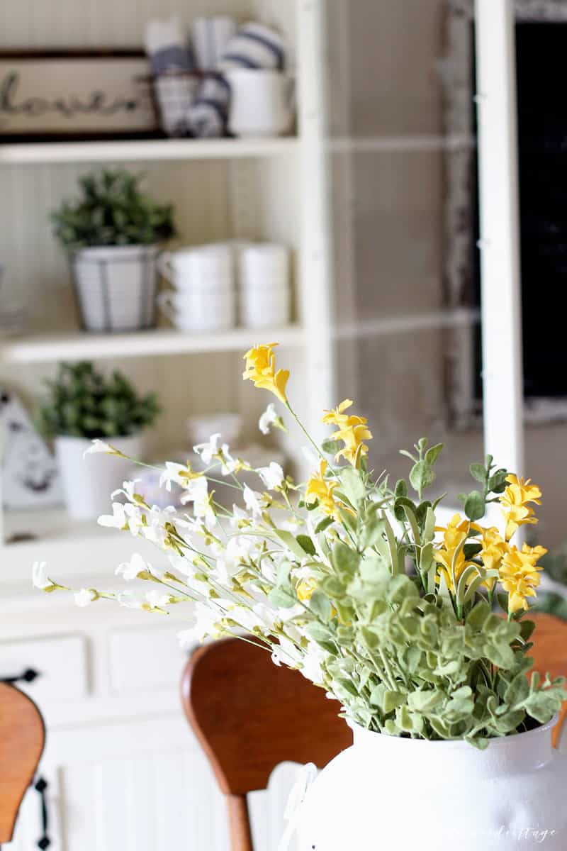 Learn how to bring the spring season into your home (even if the weather isn't cooperating!) with my simple tips on how to style a hutch for spring!