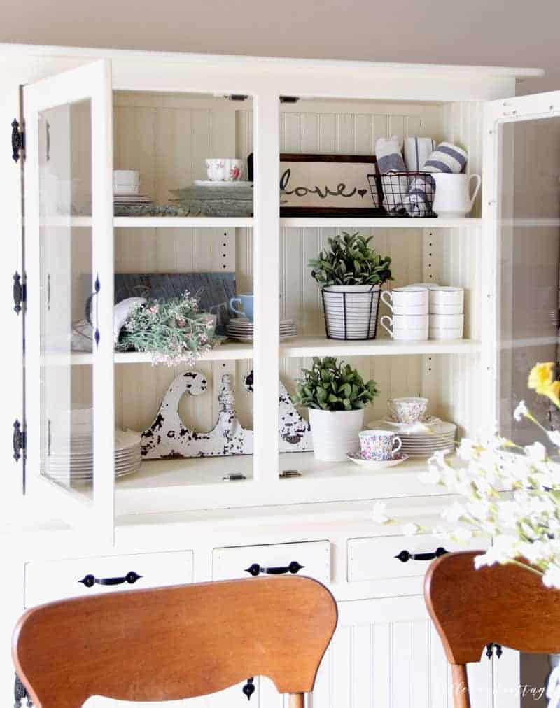 Learn how to bring the spring season into your home (even if the weather isn't cooperating!) with my simple tips on how to style a hutch for spring!