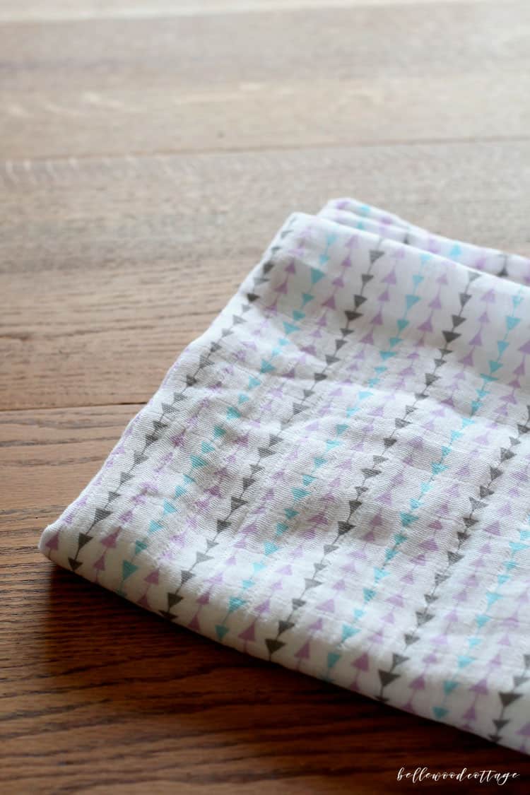 A finished muslin swaddle blanket.