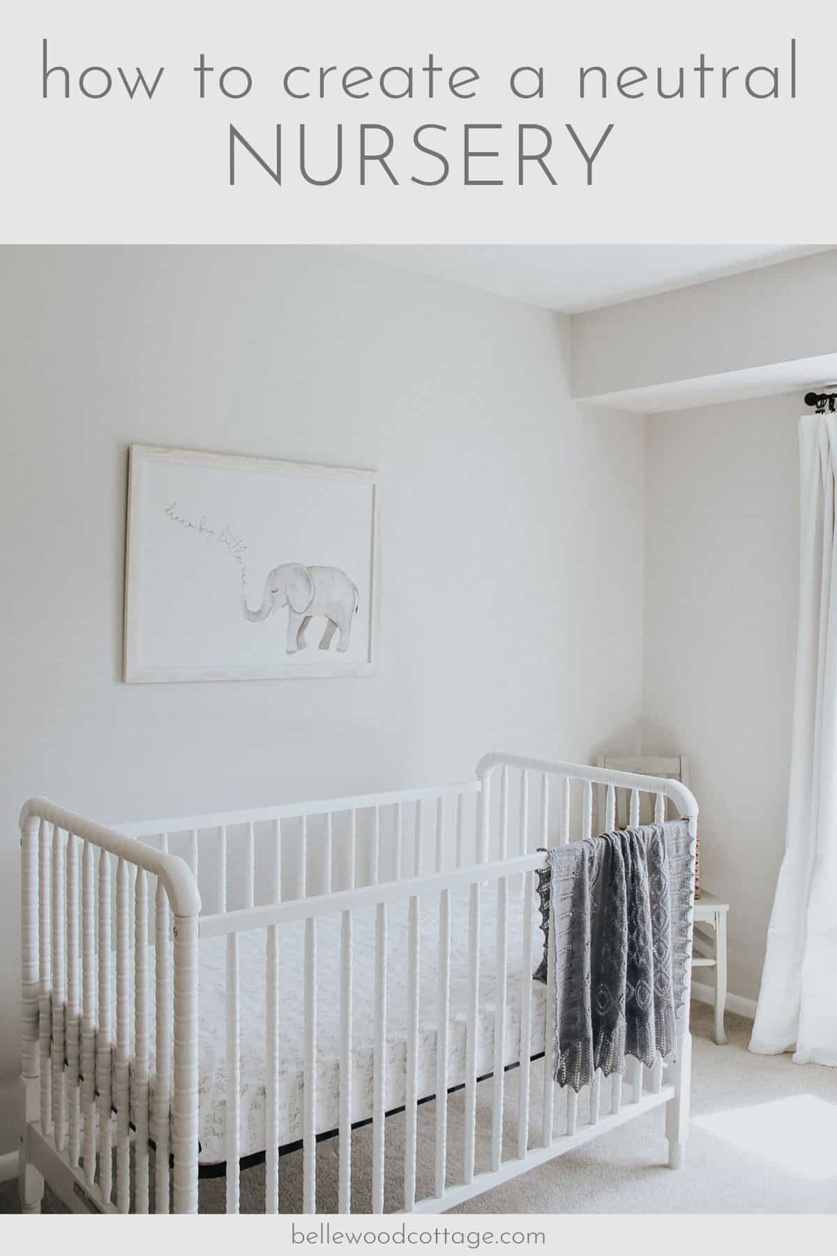 Jenny Lind crib, elephant art, and hand knit heirloom blanket in a gray nursery.