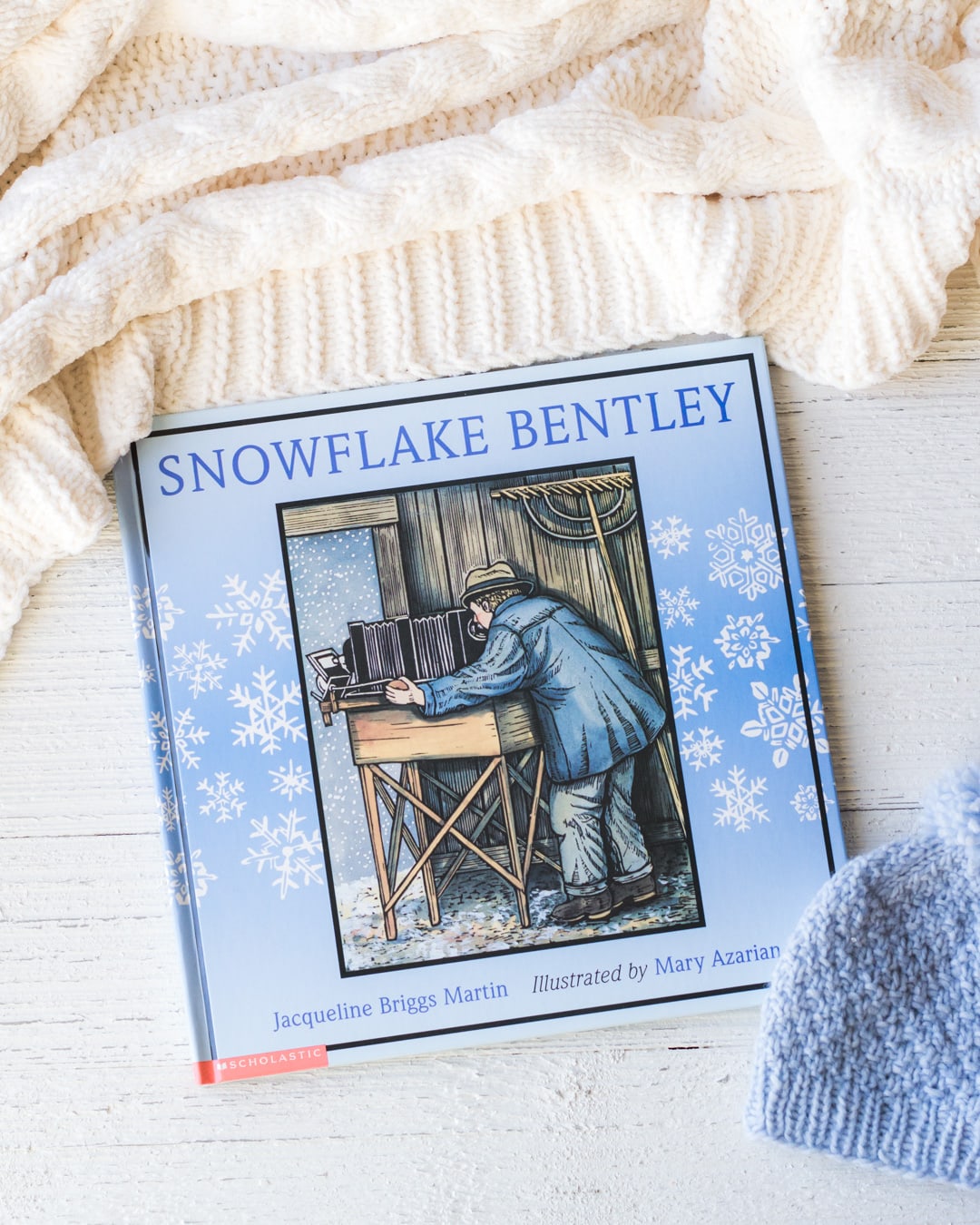 The picture book, Snowflake Bentley, unopened on a wooden surface.