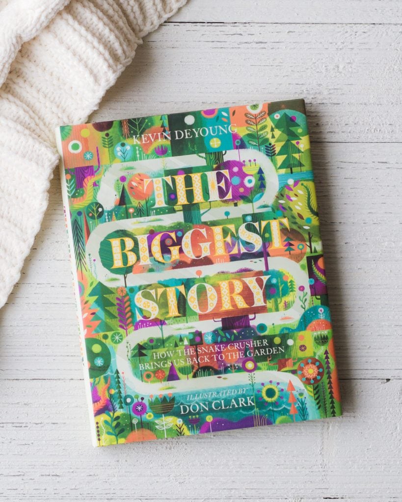 The Biggest Story book on a wooden surface.