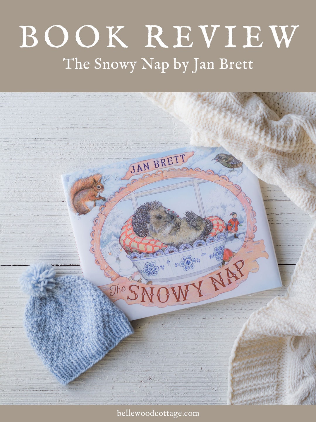 The Snowy Nap book on a wooden surface.