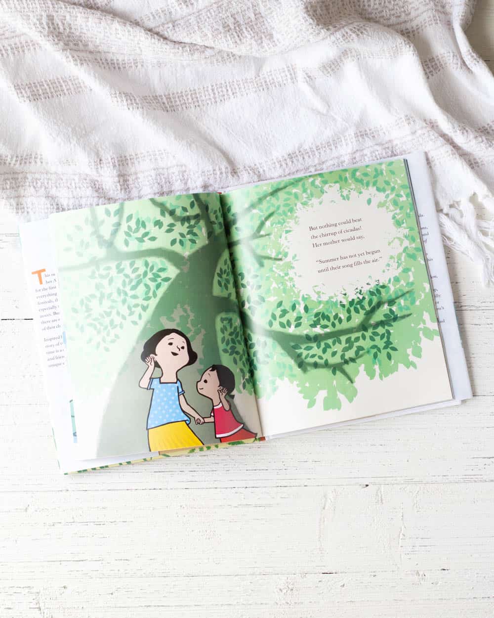 A picture book on a wooden background.