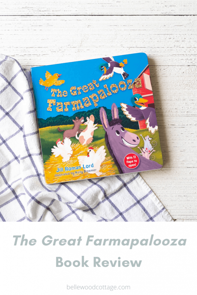 A new board books for kids, The Great Farmapalooza, on a wooden background.