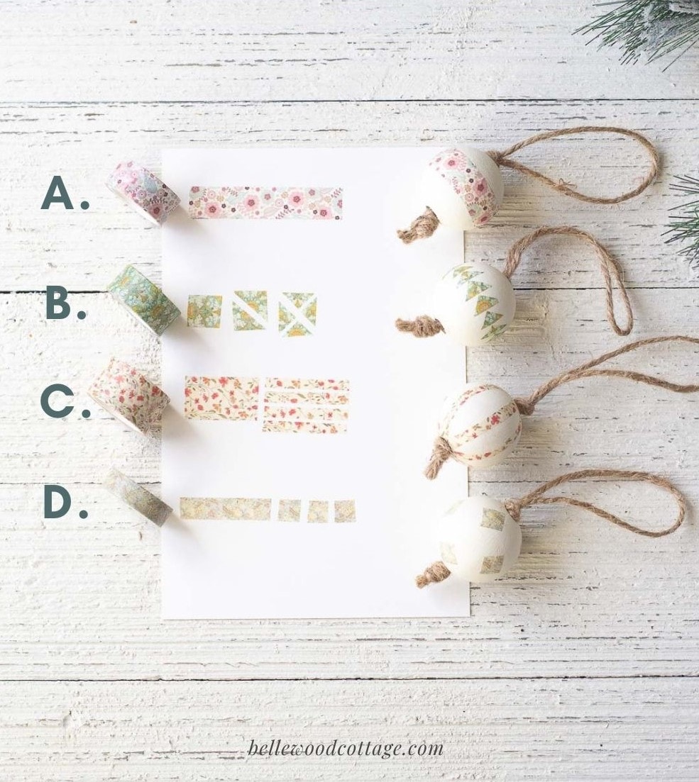 Four different washi tape Christmas ornaments designs laid out on a wooden surface.