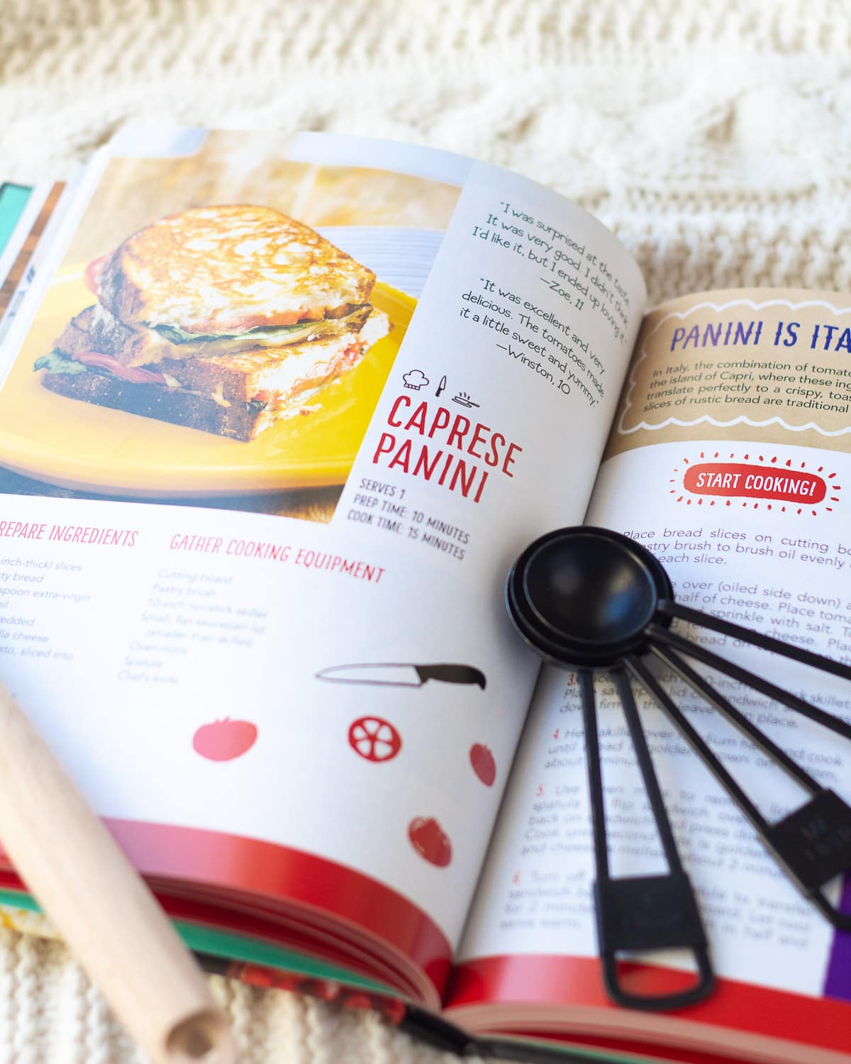 A cookbook open to a recipe page on a wooden surface.