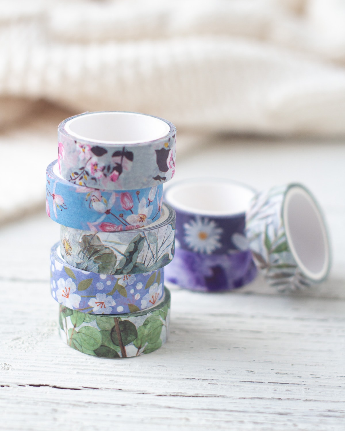 Floral washi tape in a stack.