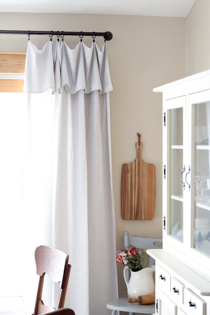 Farmhouse style drop cloth curtains.