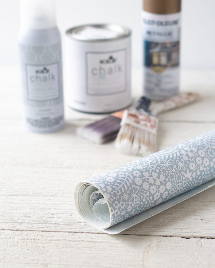 A roll of blue floral contact paper.