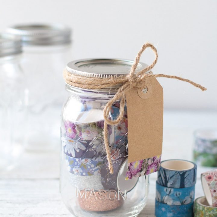 Mason jar washi tape gift idea tied with a gift tag.