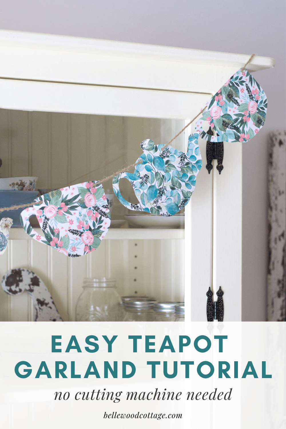 A teapot garland made from scrapbook paper hanging on a farmhouse hutch with the words, "Easy Teapot Garland Tutorial."