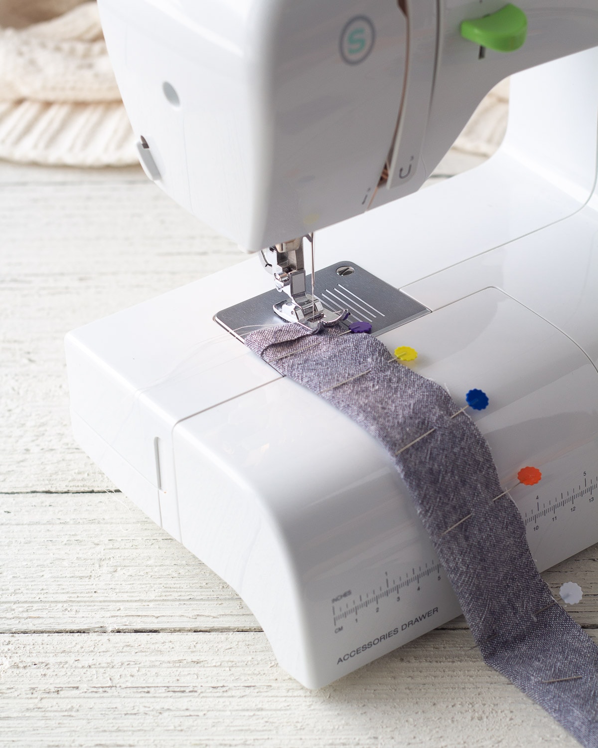 Sewing a scrunchie seam with a sewing machine.