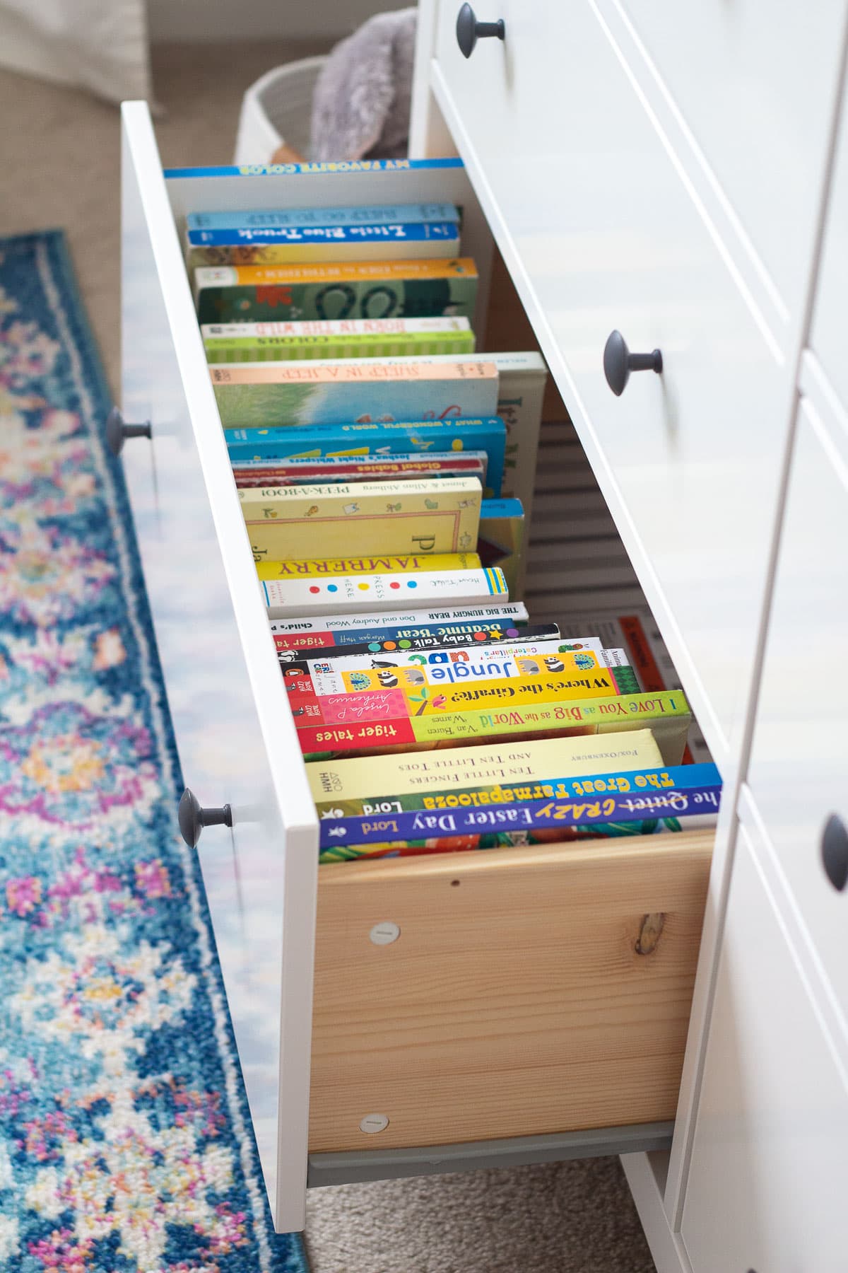 How to store kids books in the drawer of a dresser.