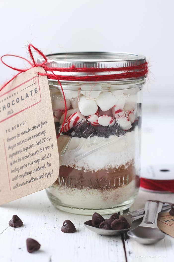 A mason jar layered with hot chocolate mix for an easy handmade gift.