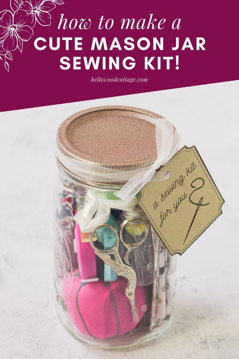 A mason jar sewing kit filled with sewing supplies.