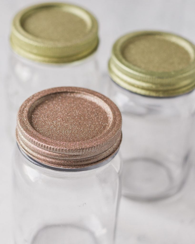 Rose gold glitter mason jar lid.