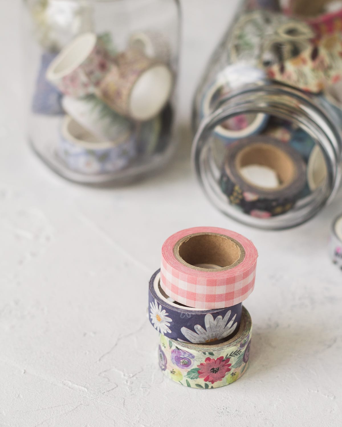 Three washi tape spools in a stack.