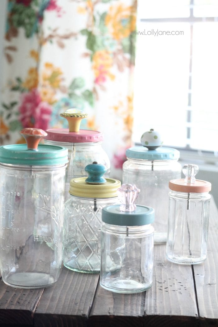 Mason jars upcycled with glass knobs.