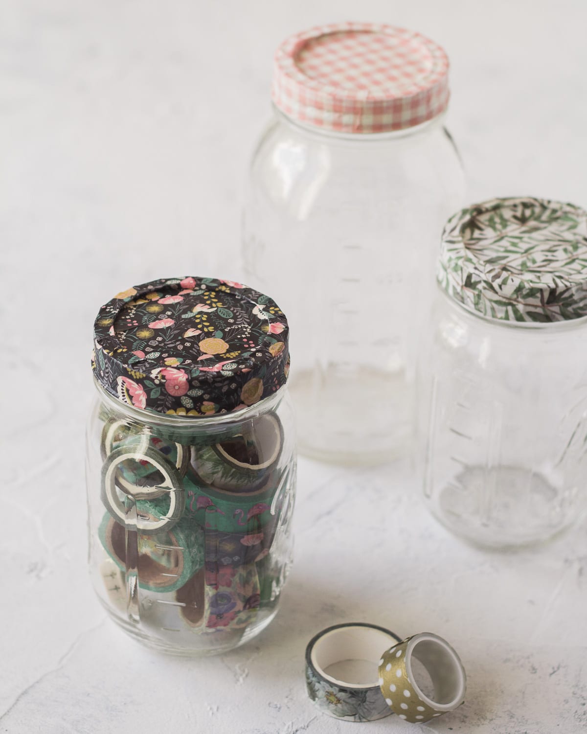 Mason Jars with washi tape covered lids.