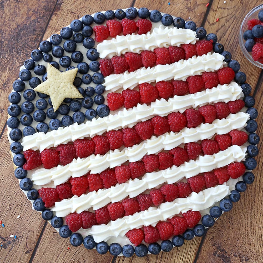 A Round American Flag Fruit Pizza made from sugar cookie dough.