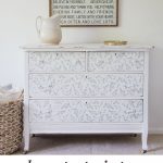 A stenciled white and blue dresser with an ironstone pitcher on top of it, with the words, "how to paint a dresser".