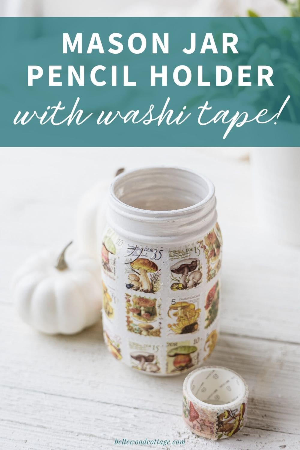 A washi tape decorated mason jar with the words, "Mason Jar Pencil Holder with Washi Tape"