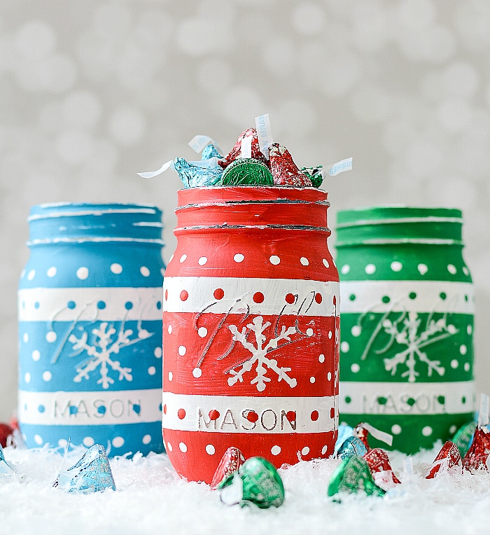 Christmas "Sweater" mason jars painted in green, blue, and red.