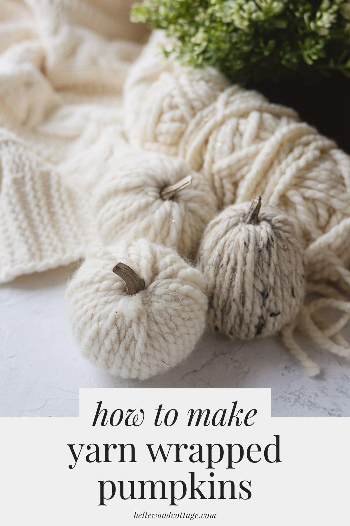Neutral yarn pumpkins with the words, "How to Make Yarn Wrapped Pumpkins".