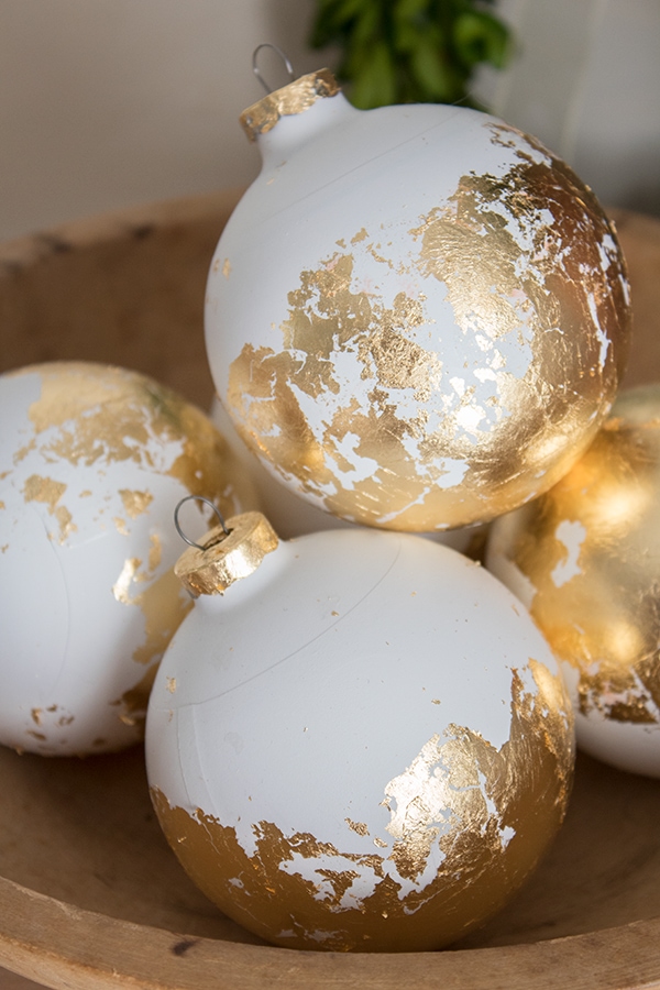 Homemade ornaments decorated with gold leaf.