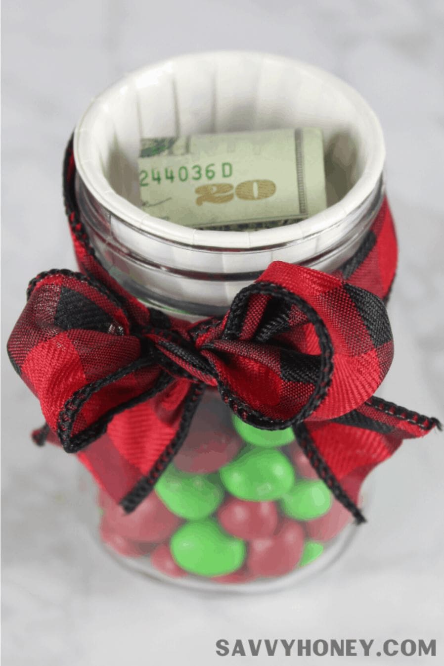 Cash concealed in a candy-filled mason jar.