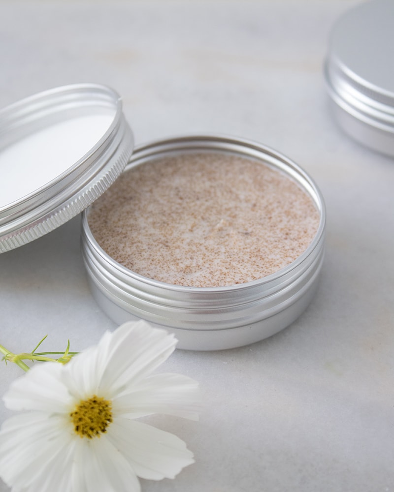 Homemade brown sugar scrub in a tin.