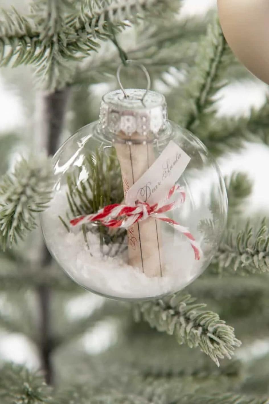 A "Letter to Santa" enclosed in a clear ornament.