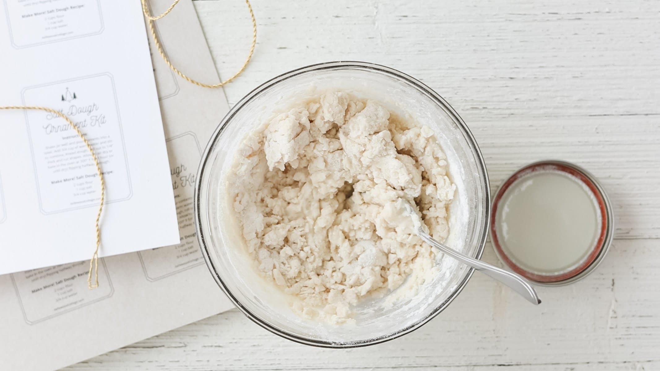 A bowl of salt dough being mixed up.