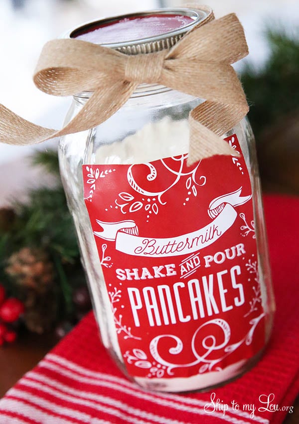 A jar of homemade shake and pour pancake mix with a Christmas label.