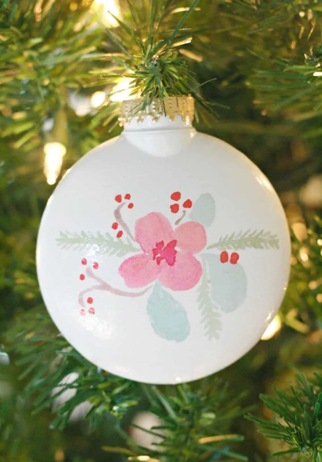 A ceramic ornament with a floral temporary tattoo.